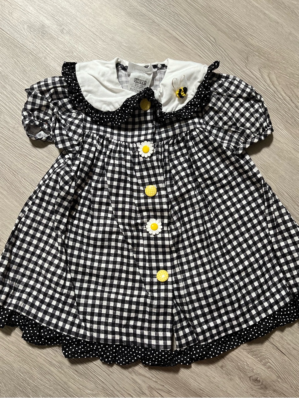 Bonnie Jean Black & White Gingham Dress with Yellow Daisy Accent